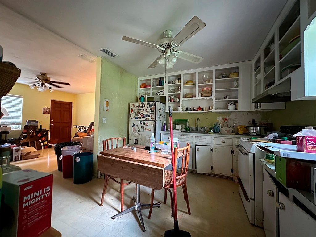 Before: a cramped, dated kitchen