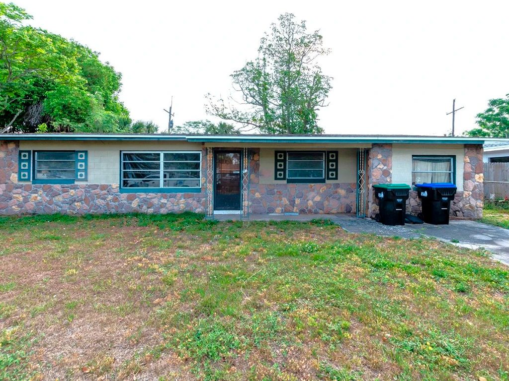 Before: tired ranch house exterior